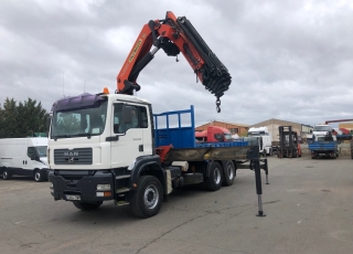 Used truck MAN TGA 310, 6x4 year 2004 with 200.070km, with open box and crane Palfinger PK44002C.
