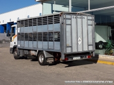 Truck IVECO ML100E18, year 1997, with box to transport animals with two floors and elevator.