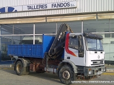 Used truck IVECO eurocargo ML180E27, year 2000, with hook container system.

Accesories:
- Box with crane Hiab 102- 3.4