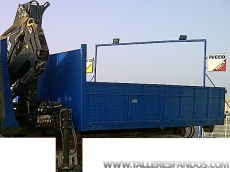 Used truck IVECO eurocargo ML180E27, year 2000, with hook container system.

Accesories:
- Box with crane Hiab 102- 3.4