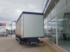 IVECO Eurocargo ML180E28, del año 2006, con 169.588km, con aire acondicionado, lleva caja tauliner con paredes y techo corredero y techo elevable, caja de 9.35m largo x 2,47m ancho x 2.80 de alto con el techo sin elevar.