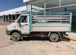 Used Van IVECO 35-10W with open box, year 1990. 4x4