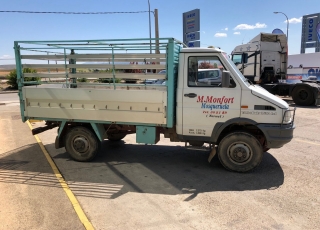 Used Van IVECO 35-10W with open box, year 1990. 4x4