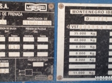 Bañera basculante marca Montenegro, de 3 ejes de ballesta, el primero elevable. año 2003