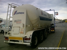 Cement tank of aluminium brand Hermans, drum brakes, air suspension, capacity 31m3, year 1997.